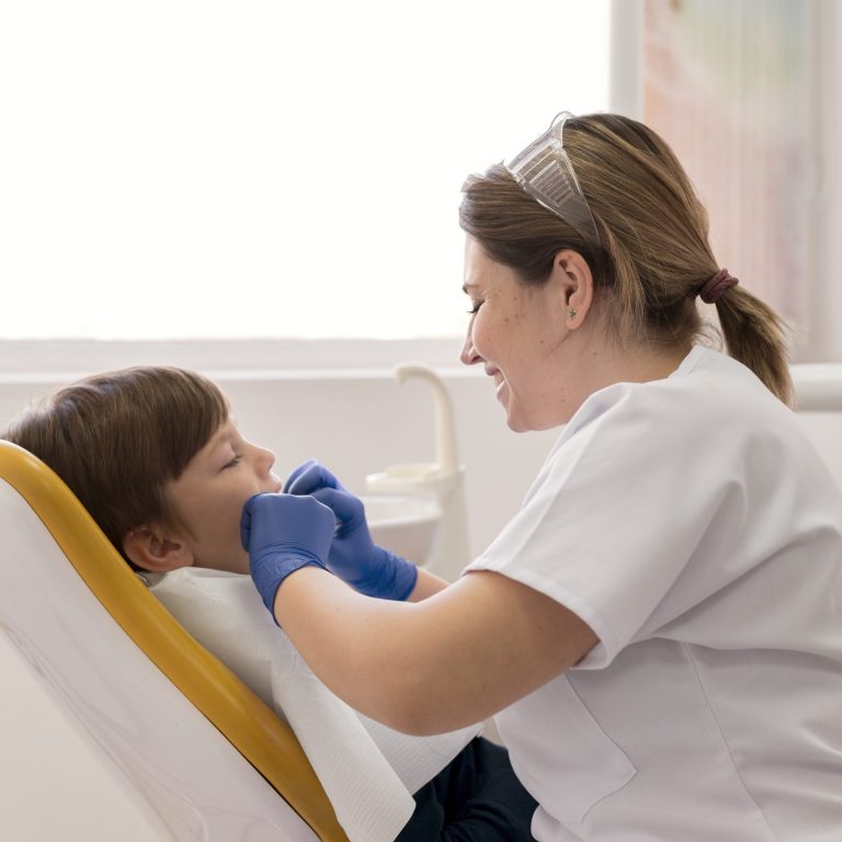 dentist-cleaning-child-s-teeth