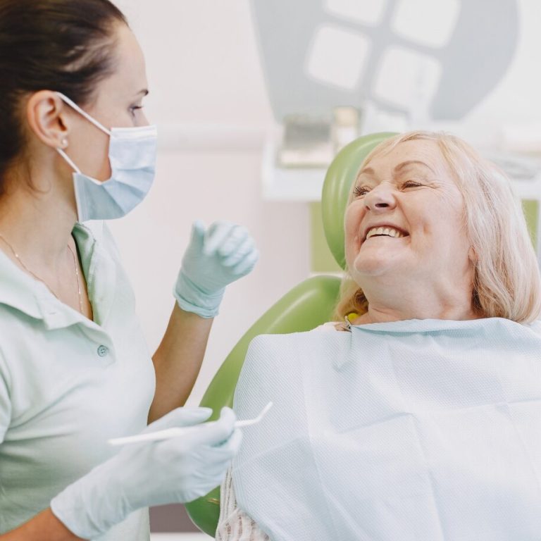 senior-woman-having-dental-treatment-dentist-s-office-woman-is-being-treated-teeth_1157-42164